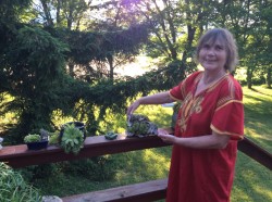 Grove member Satyam with her plant offering